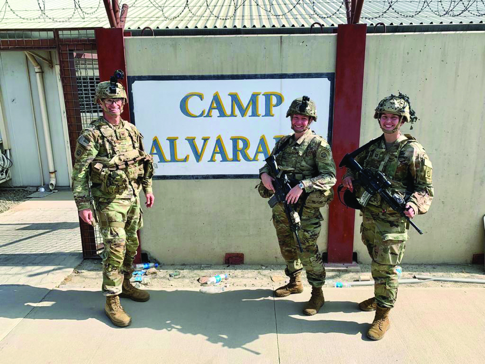 Colonel Jeffrey Thurnher (left), Major Rachel Walkup (center), and Captain Hayley Boyd (right) were all part of
        the 82d Airborne Division’s mid-August 2021 rapid deployment to Afghanistan. (Photo courtesy of author)