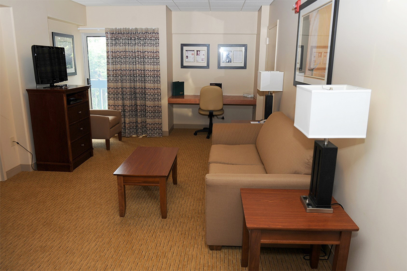 Couch and TV in hotel room